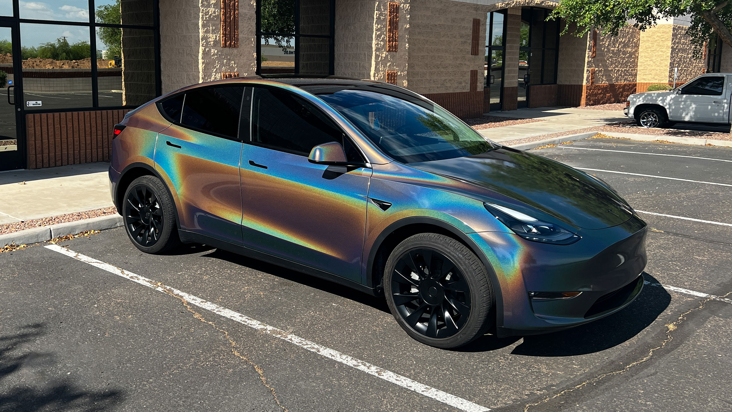 Tesla Model Y with color change vinyl wrap